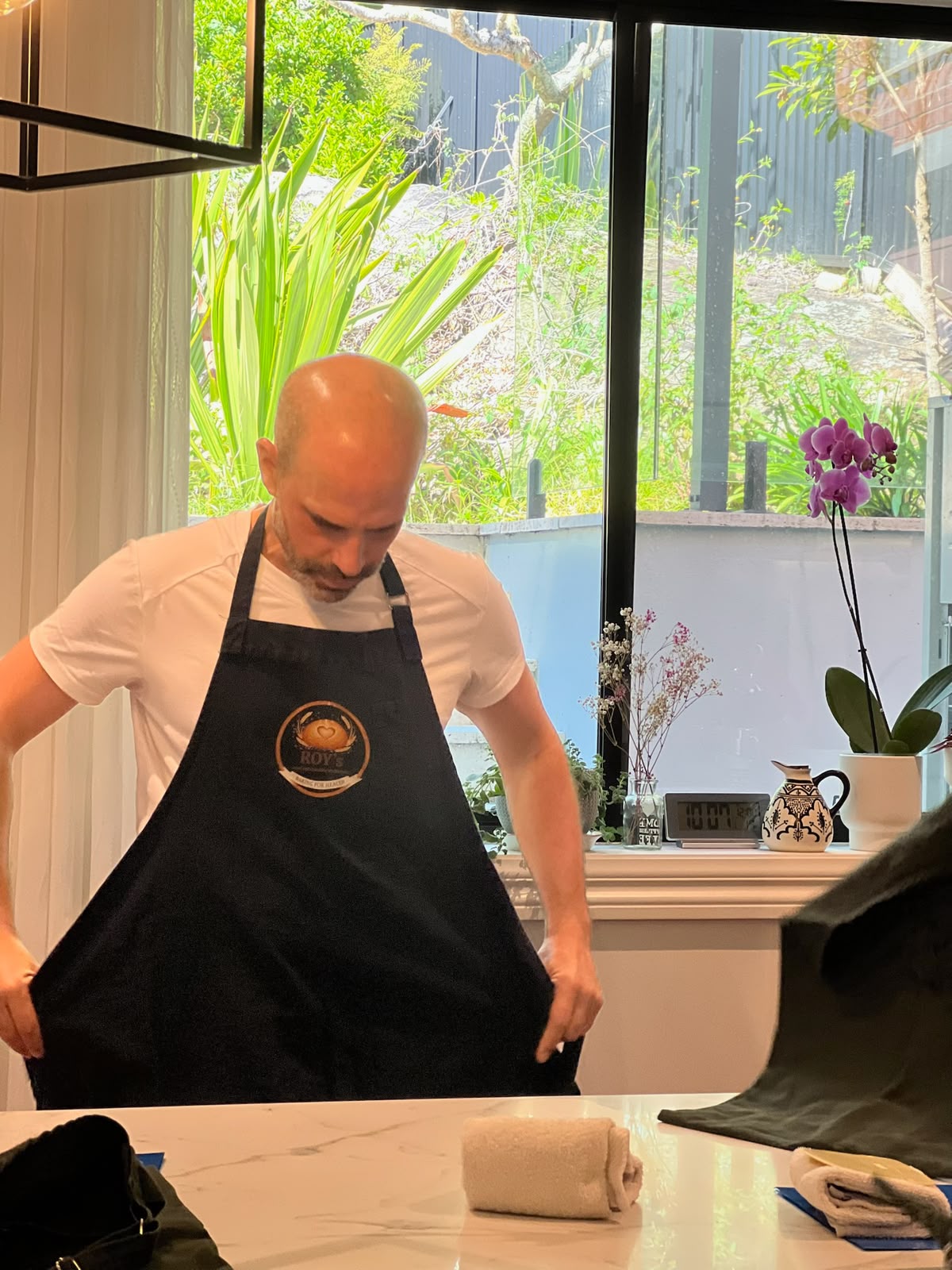 Roy setting up an apron before a workshop